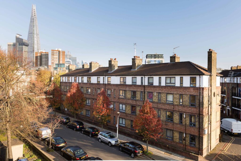 Elim estate street view with cars and trees
